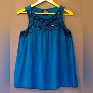 Decorative stitched Tank Top with sequins.